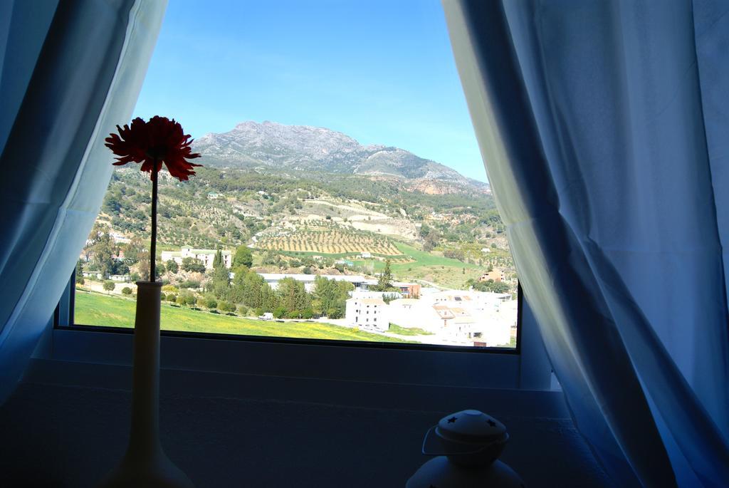 Hostal Sango Sierra De Las Nieves Alozaina Esterno foto